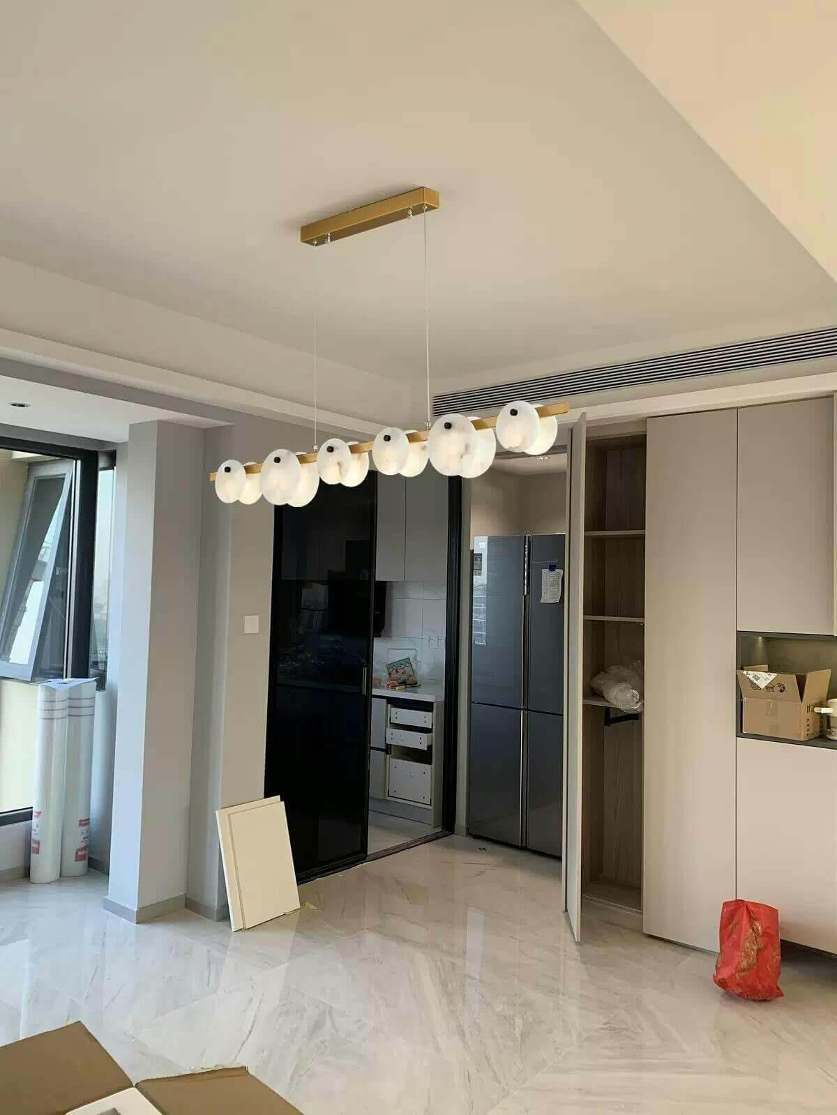 Frumix alabaster chandelier in modern kitchen, showcasing a linear design with 5 lights, perfect for mid-century modern lighting.