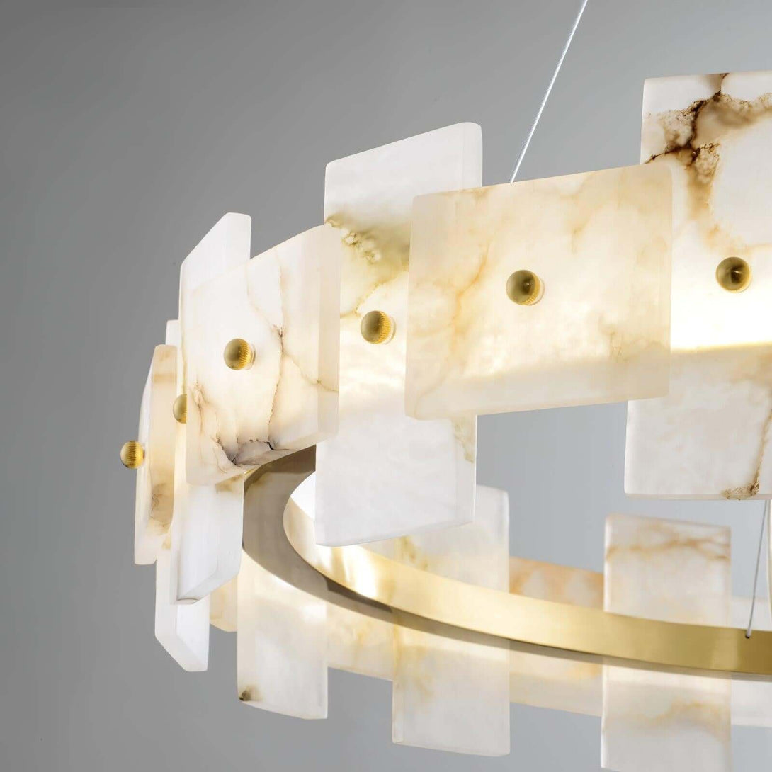 Elegant alabaster chandelier with brass accents, perfect for dining room tables, showcasing a vintage design.