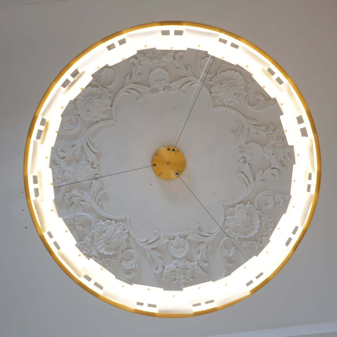 Intricate plaster ceiling design with backlit rim, showcasing a vintage aesthetic.