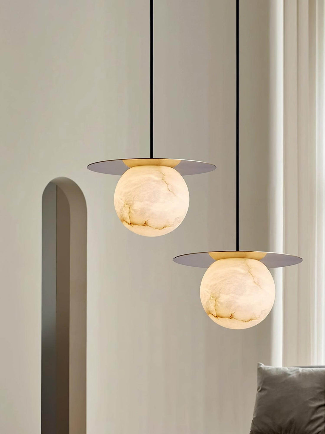Elegant Orbix pendant lights in alabaster, perfect for modern bathrooms and scandi interiors.
