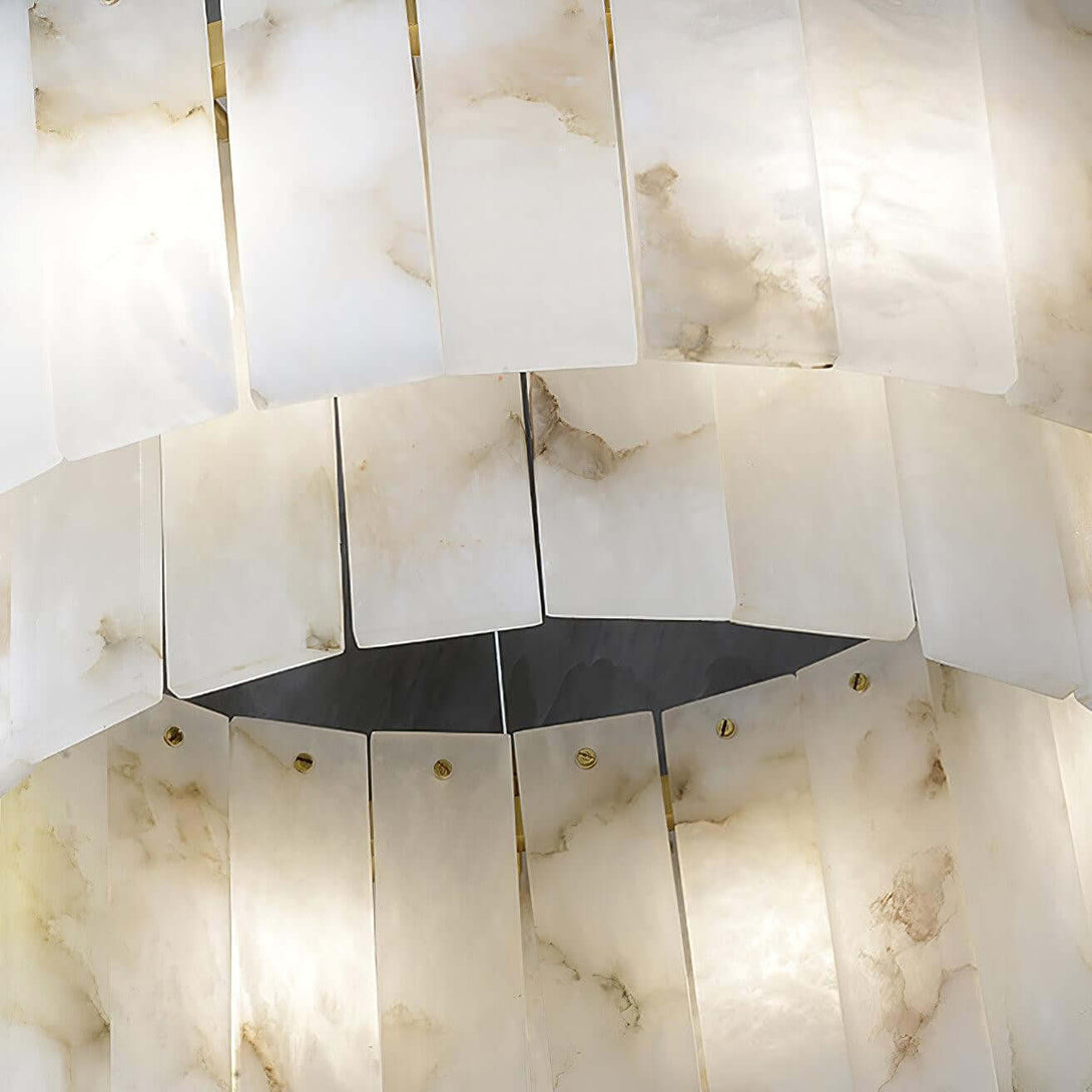 Elegant alabaster chandelier showcasing exquisite white tiles and warm lighting, perfect for a Victorian home decor.