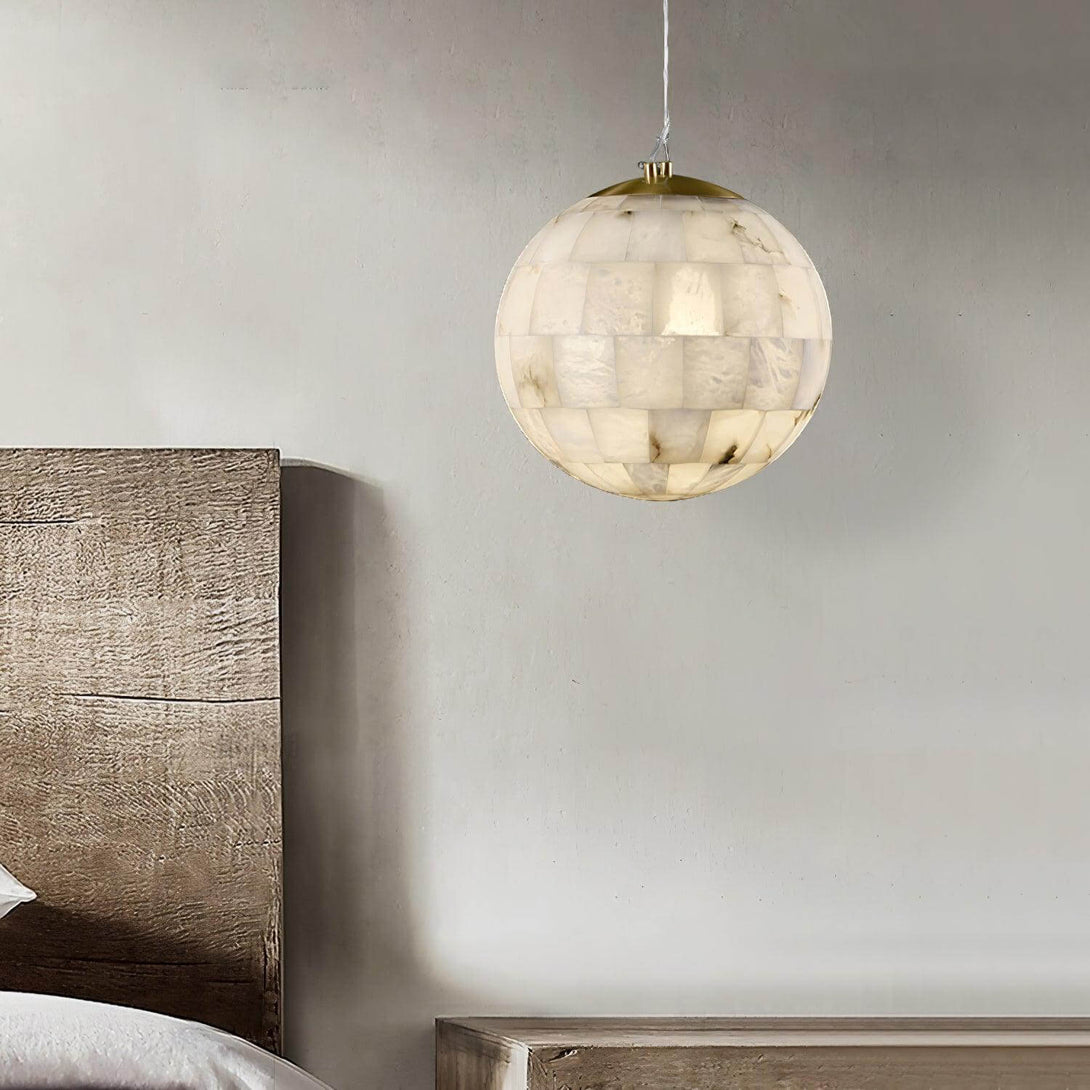 Zarqe Pendant Light in alabaster, a spherical pendant light fixture ideal for kitchen or bedroom decor.