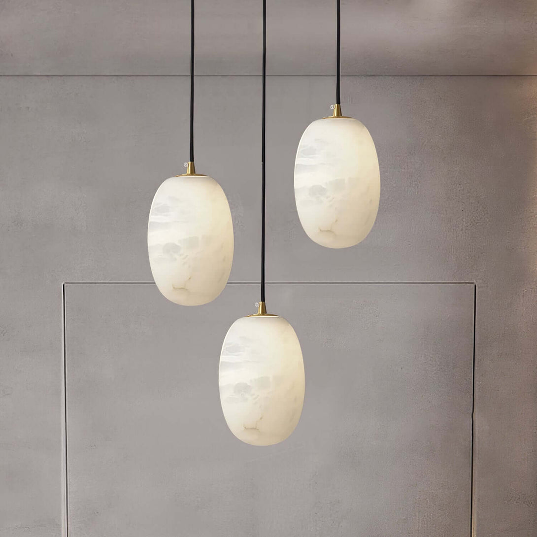 Zelino pendant light trio in alabaster, perfect for kitchen island lighting with MCM style.