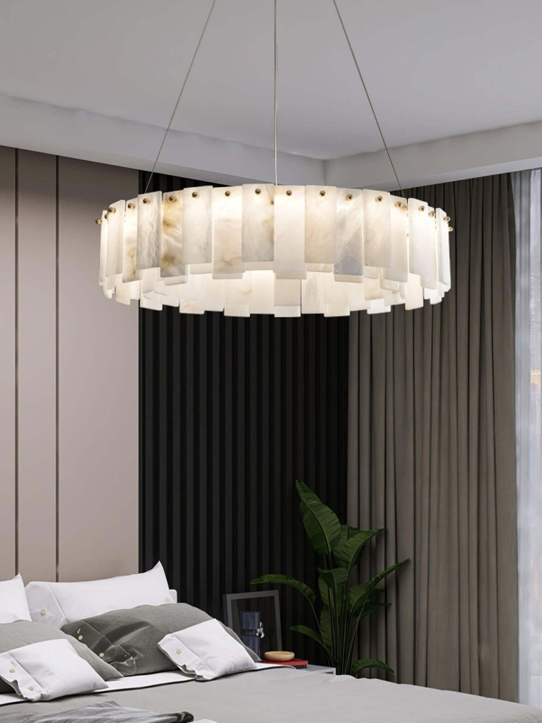 Zemora alabaster chandelier in modern bedroom, round mid-century lighting, stylish decor accent.