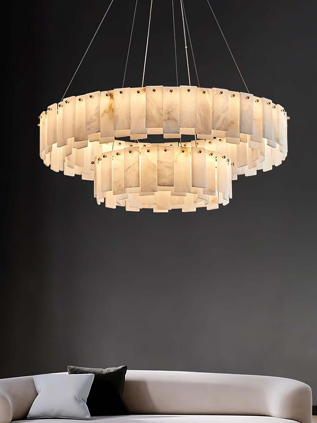 Zemora alabaster chandelier, round design with mid-century modern lighting, illuminating a stylish living space.