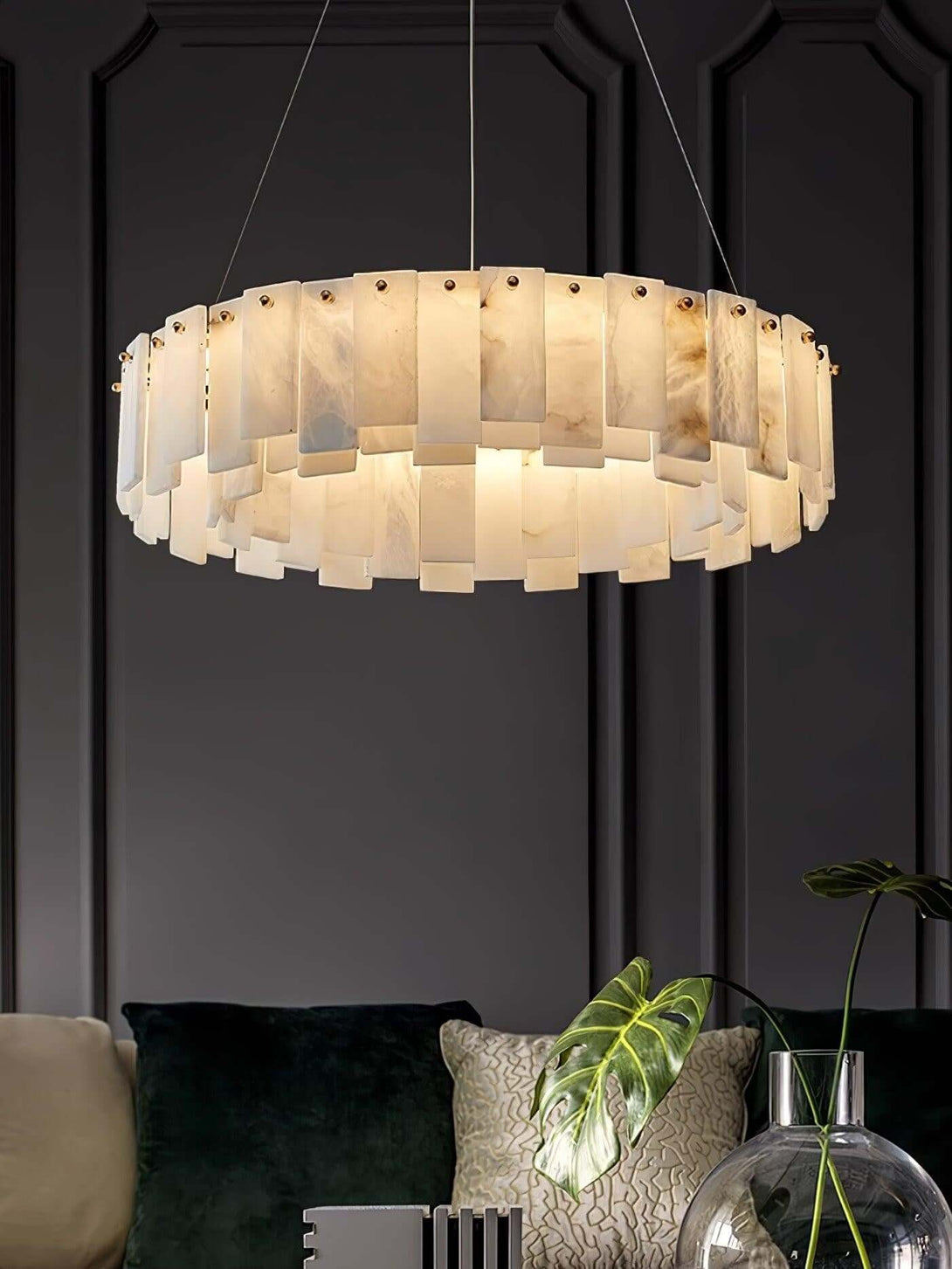 Zemora chandelier featuring alabaster design, round shape, and mid-century modern style, illuminating a stylish interior.