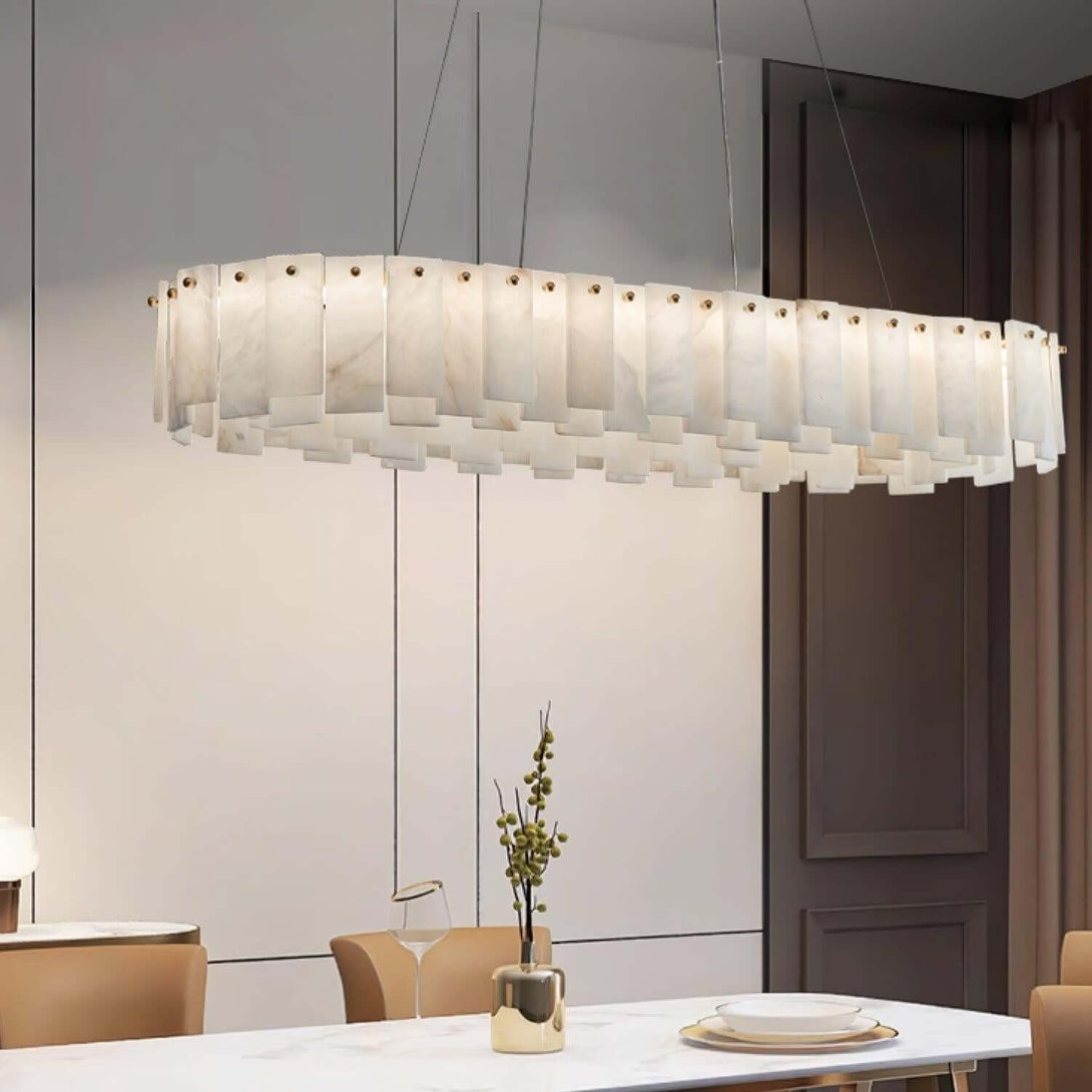 Zemora Chandelier featuring alabaster material, mid century modern design, elegantly illuminating a dining area.