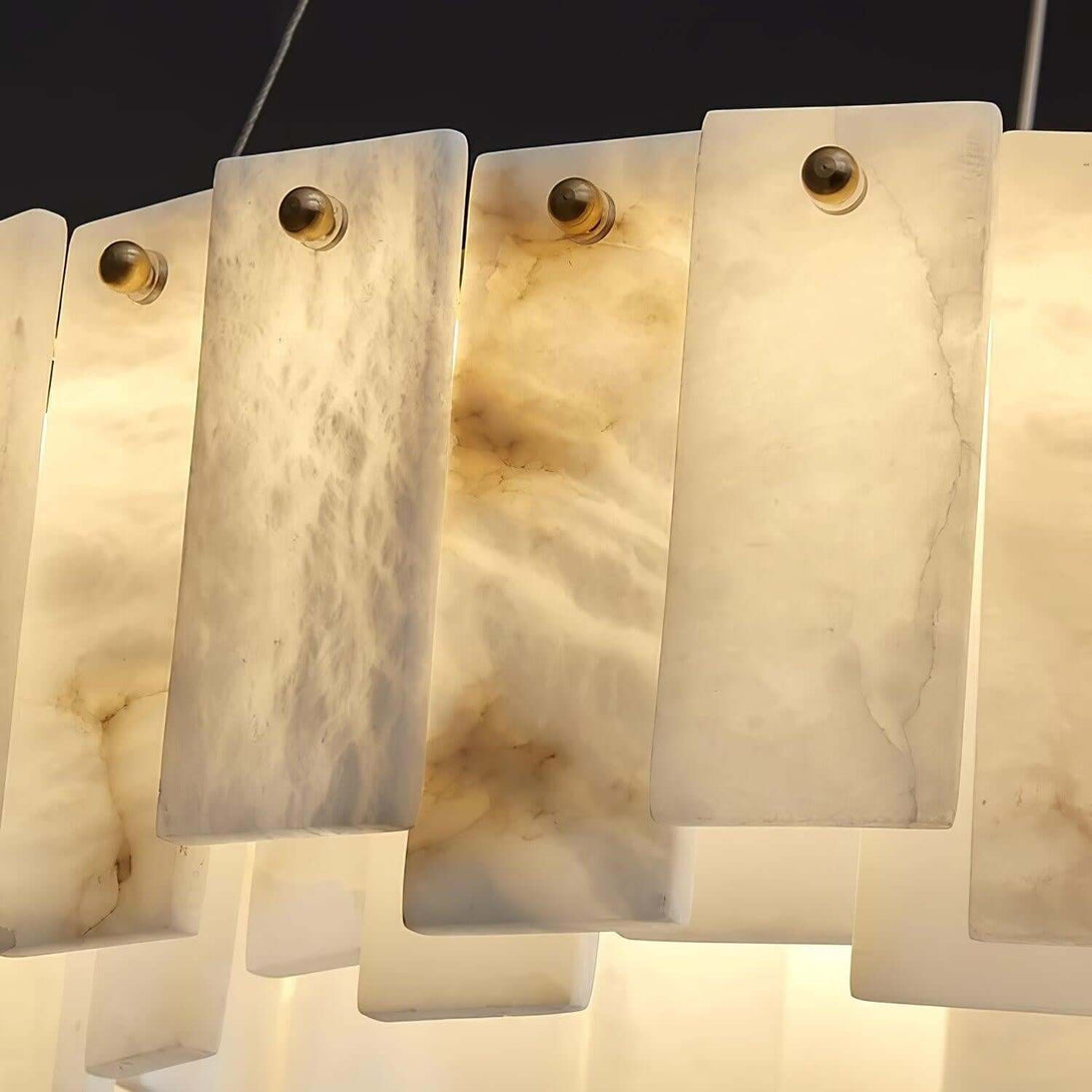 Close-up of alabaster panels in the Zemora chandelier, showcasing mid-century modern design and soft lighting.