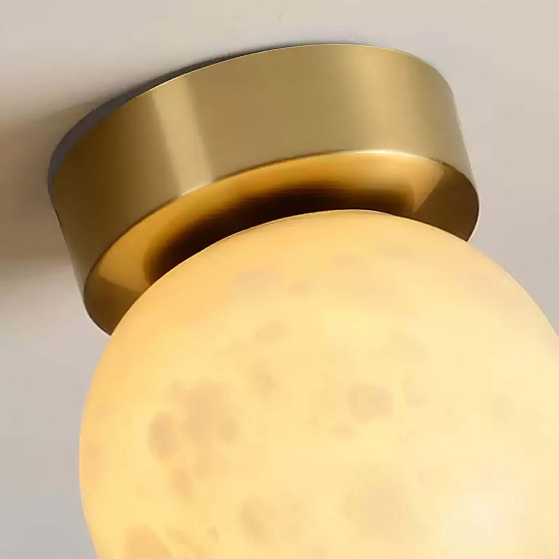 Zolume ceiling light with alabaster glass and gold finish, perfect for small bathroom or art deco style.