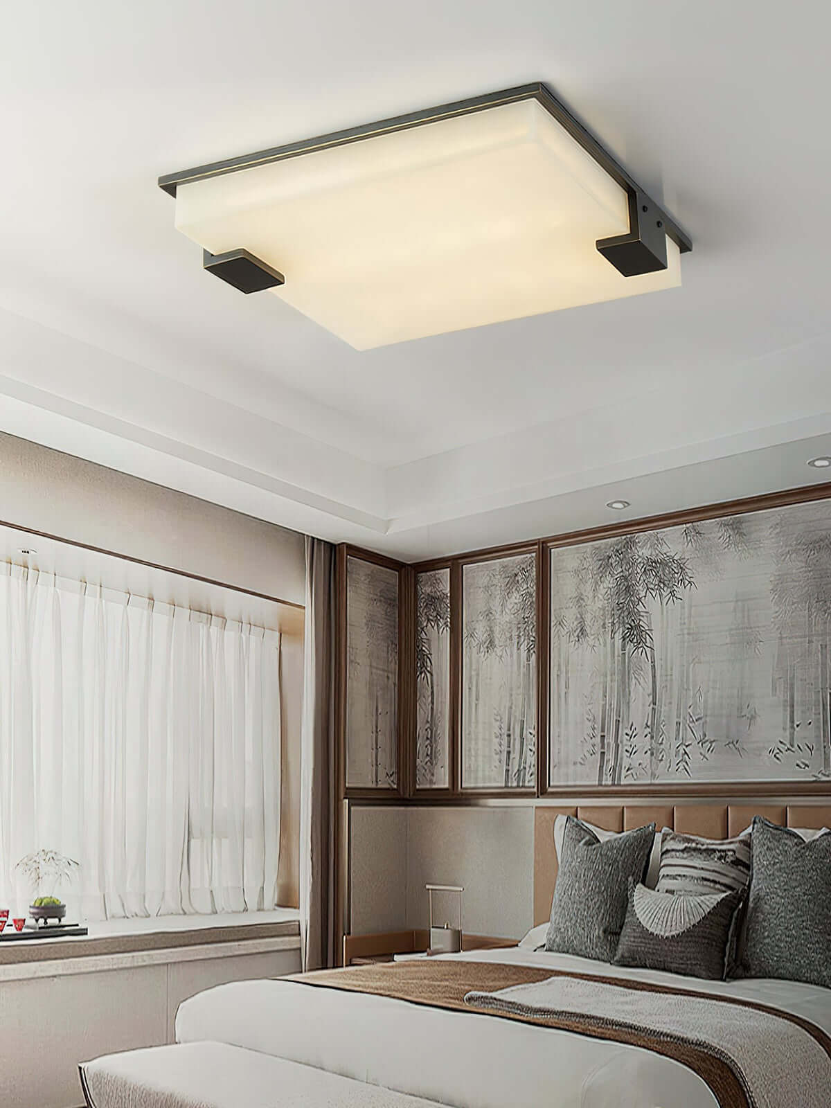 Faylen ceiling light in a cozy bedroom, showcasing alabaster flush mount design and mid-century style.
