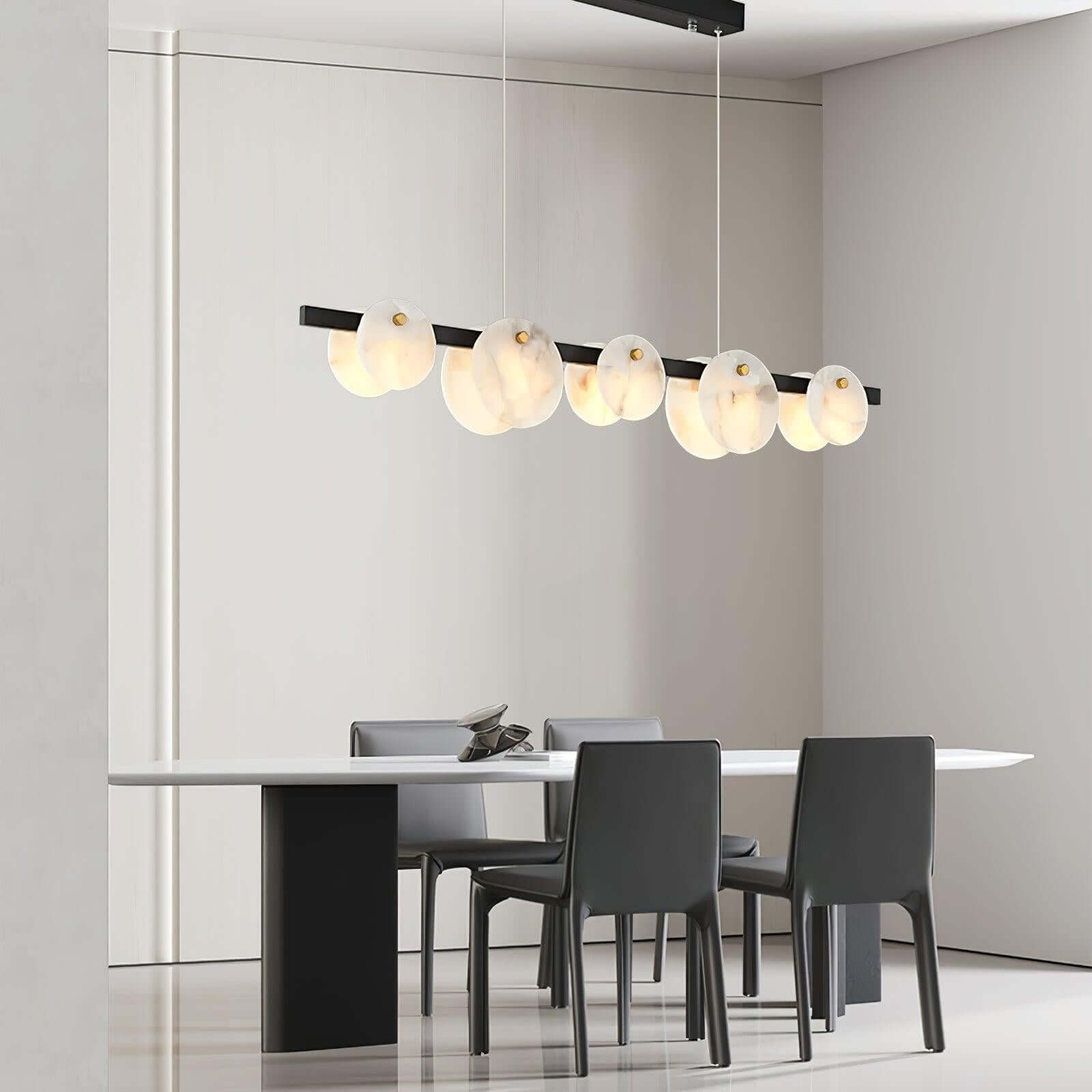 Frumix 6-Light alabaster linear chandelier in a modern dining room, showcasing mid century modern lighting.