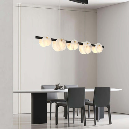 Frumix 6-Light alabaster linear chandelier in a modern dining room, showcasing mid century modern lighting.