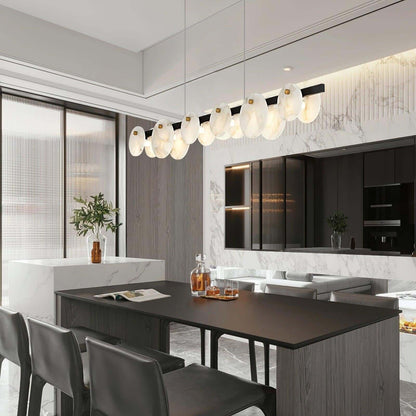 Frumix Chandelier in a modern kitchen featuring alabaster and linear design, perfect for mid-century modern lighting.