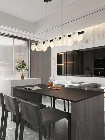 Elegant Frumix 6-light alabaster linear chandelier in a modern kitchen, showcasing mid-century modern lighting design.