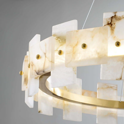Elegant alabaster chandelier with brass accents, perfect for dining room tables, showcasing a vintage design.
