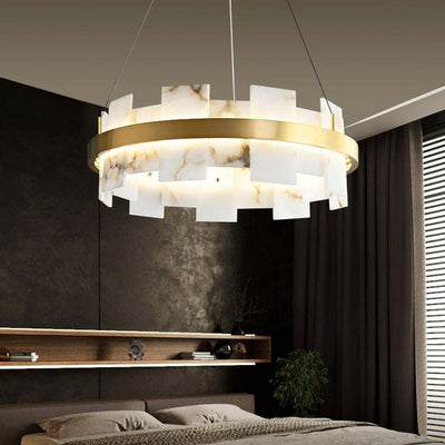 Omvilo alabaster chandelier with brass details, perfect for a vintage dining room setting.