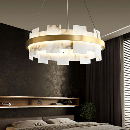 Omvilo alabaster chandelier with brass details, perfect for a vintage dining room setting.