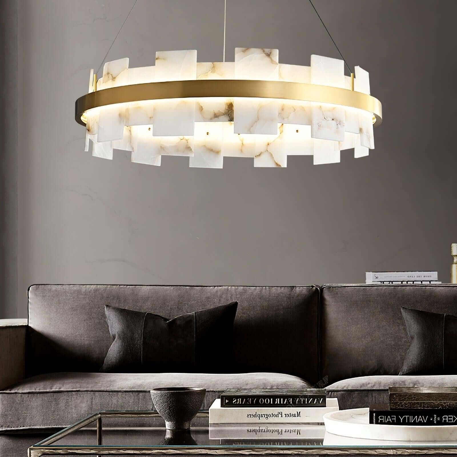 Stylish alabaster chandelier with brass accents, ideal for dining room table lighting and vintage decor.
