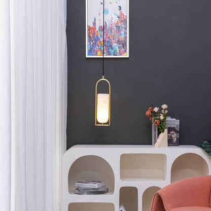 Orleni pendant light in a modern living space, featuring alabaster design, perfect for bedside or mid-century decor.