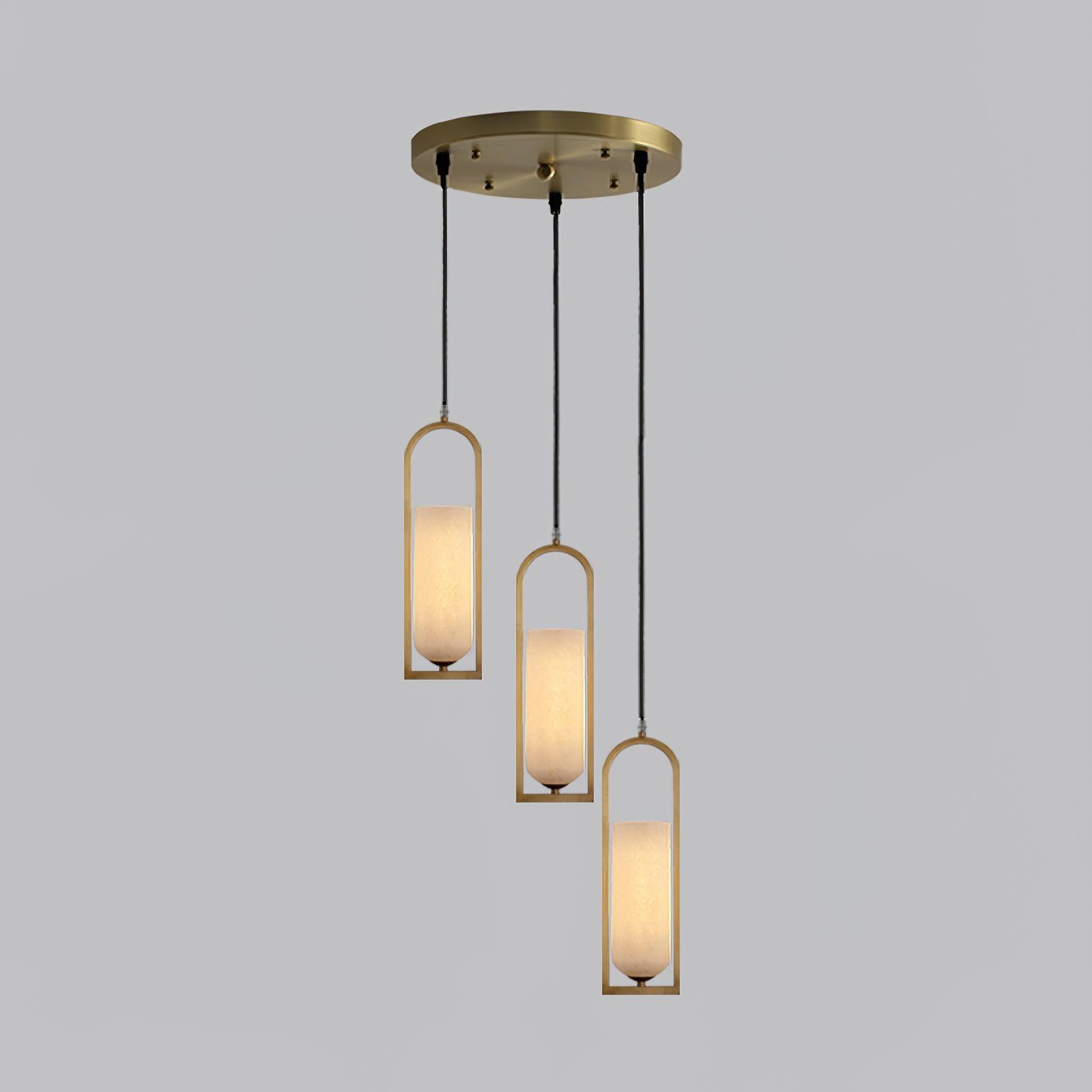 Orleni pendant light featuring three alabaster pendant lights in a mid-century modern design, perfect for bedside use.