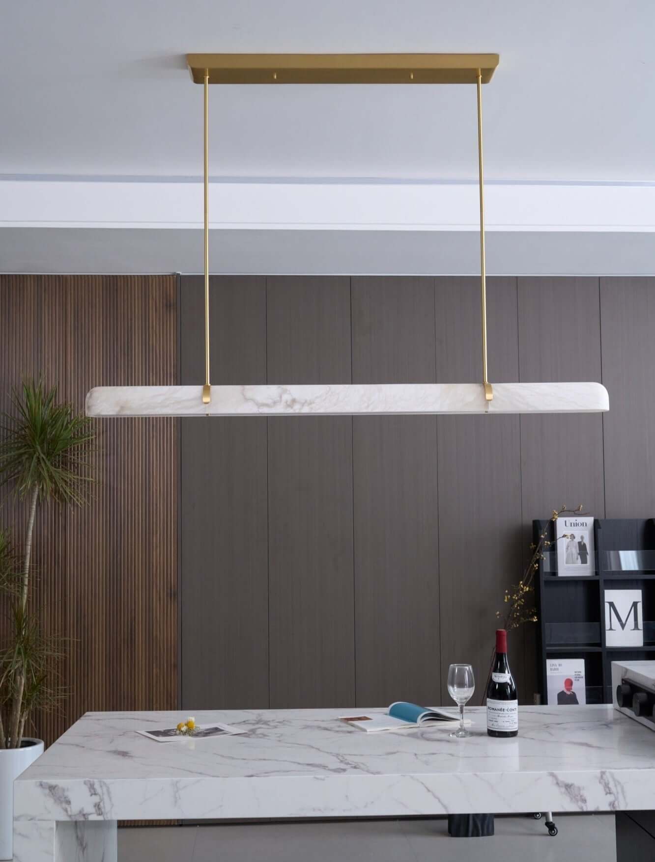 Elegant Qemir chandelier, a modern linear light fixture in alabaster, perfect for dining rooms.