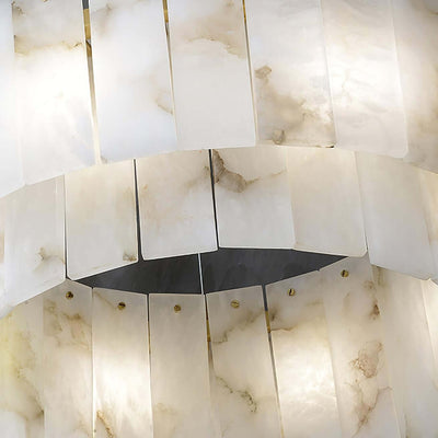Elegant alabaster chandelier showcasing exquisite white tiles and warm lighting, perfect for a Victorian home decor.