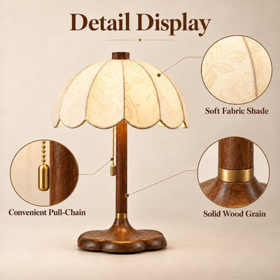 Talora table lamp details showing the floral fabric shade, hanging pull chain, and wood grain on the stem and base.