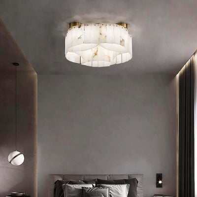 Vormia ceiling light in alabaster, a stylish art deco semi-flush mount ideal for small spaces and bathrooms.