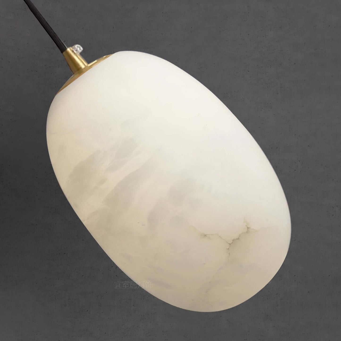 Elegant Zelino pendant light made of alabaster, perfect for kitchen pendant lighting over island, MCM style.