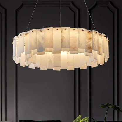 Zemora alabaster chandelier, round mid century modern lighting fixture, elegantly illuminated in a stylish interior.