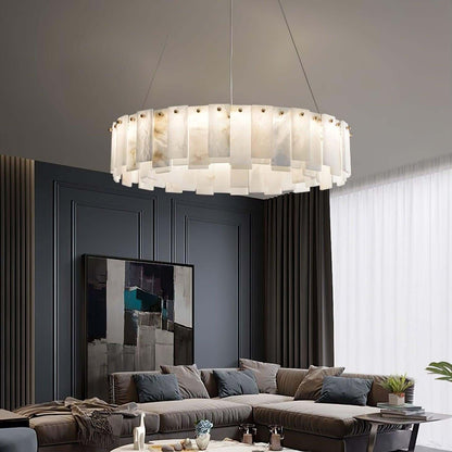 Zemora alabaster chandelier in a stylish living room, showcasing mid-century modern lighting in a round design.
