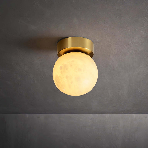 Zolume ceiling light, 15cm diameter, art deco alabaster semi flush fixture for small bathrooms on a gray ceiling.